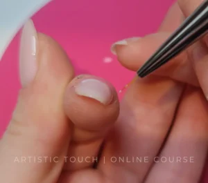 Professional BIAB Builder in a Bottle application technique showing detailed brush work on nail plate, cuticle zone, and free edge from front angle