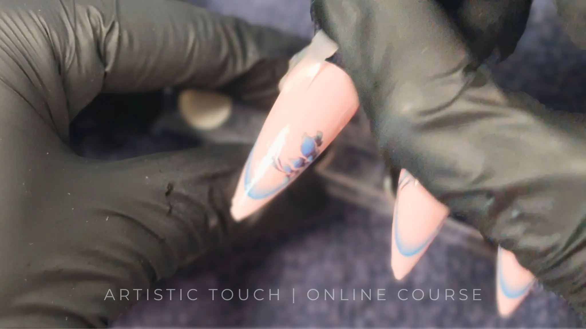 Course screenshot showing sealing technique for ombré French tip with floral decal effect for long-lasting nail art