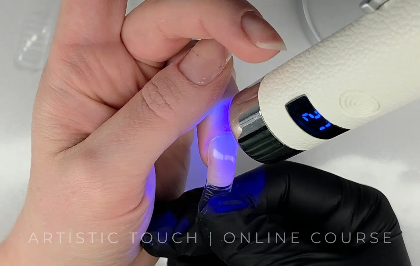 Flash curing BIAB dual forms for Instagram square nails during professional application