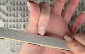 Professional square nail shaping technique using hand file for Cloud Dancer aesthetic showing proper filing method for sharp clean corners