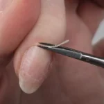 Russian manicure cuticle removal technique using professional scissors for clean cuticle work and safe e-file preparation