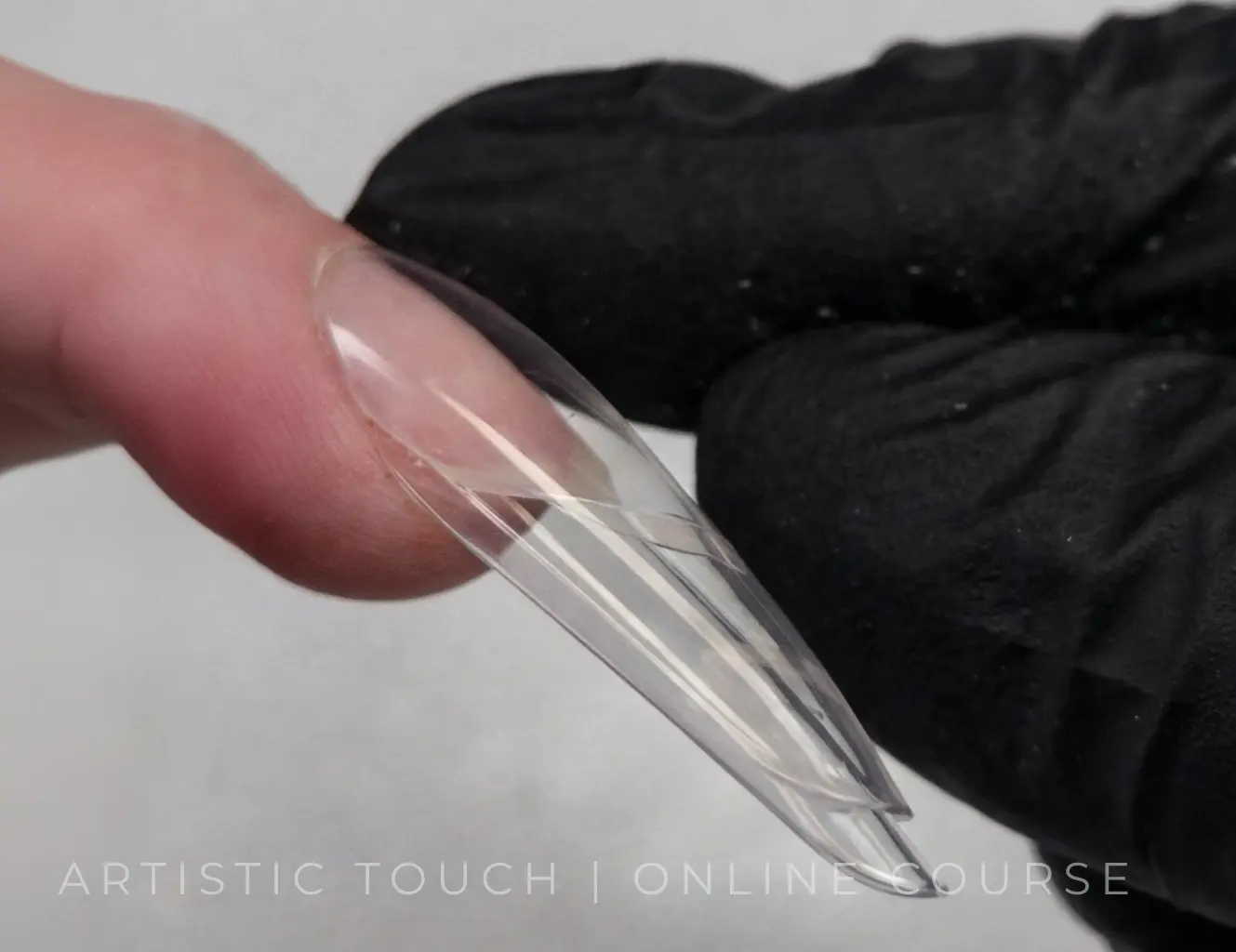 Side view of sandwich dual forms system showing nail architecture and volume on natural nail