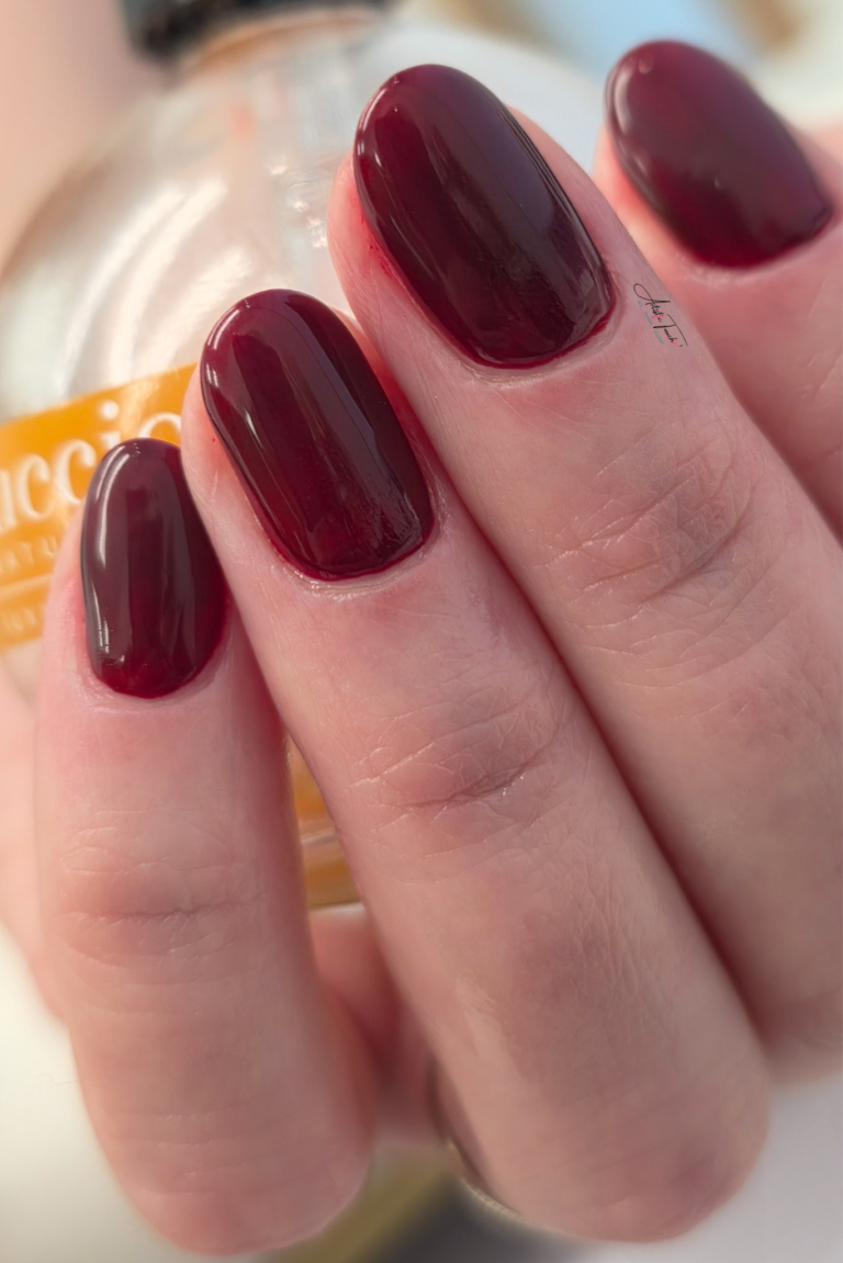 Deep burgundy glossy manicure created by Radina Ignatova